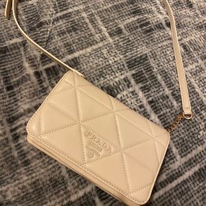 Cream crossbody Prada bag